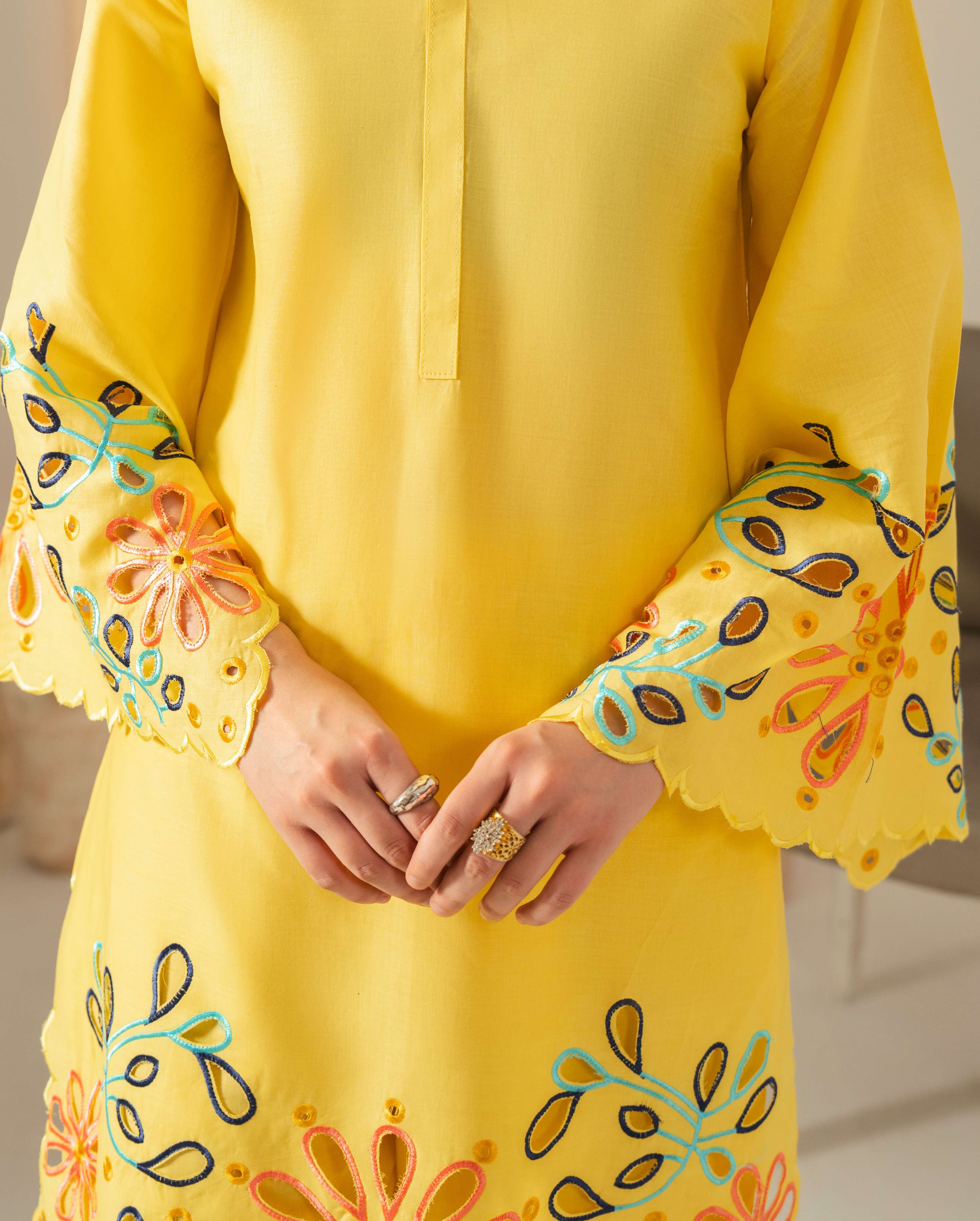 Embroidered scalloped sleeve detail on Grace Yellow suit